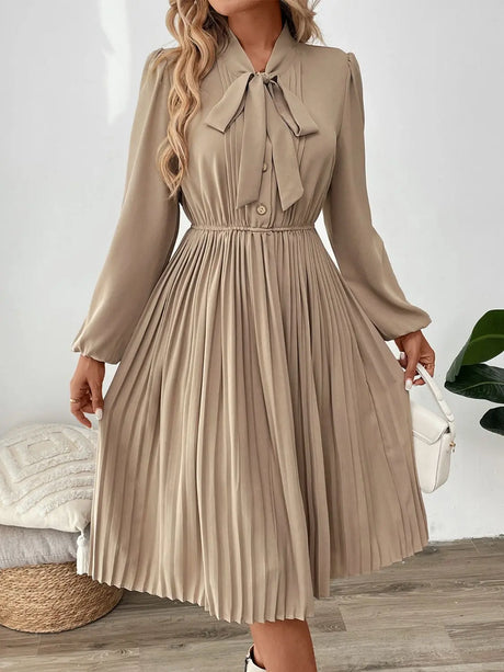 Perfee Pleated Tie Neck Long Sleeve Dress | Hanalas